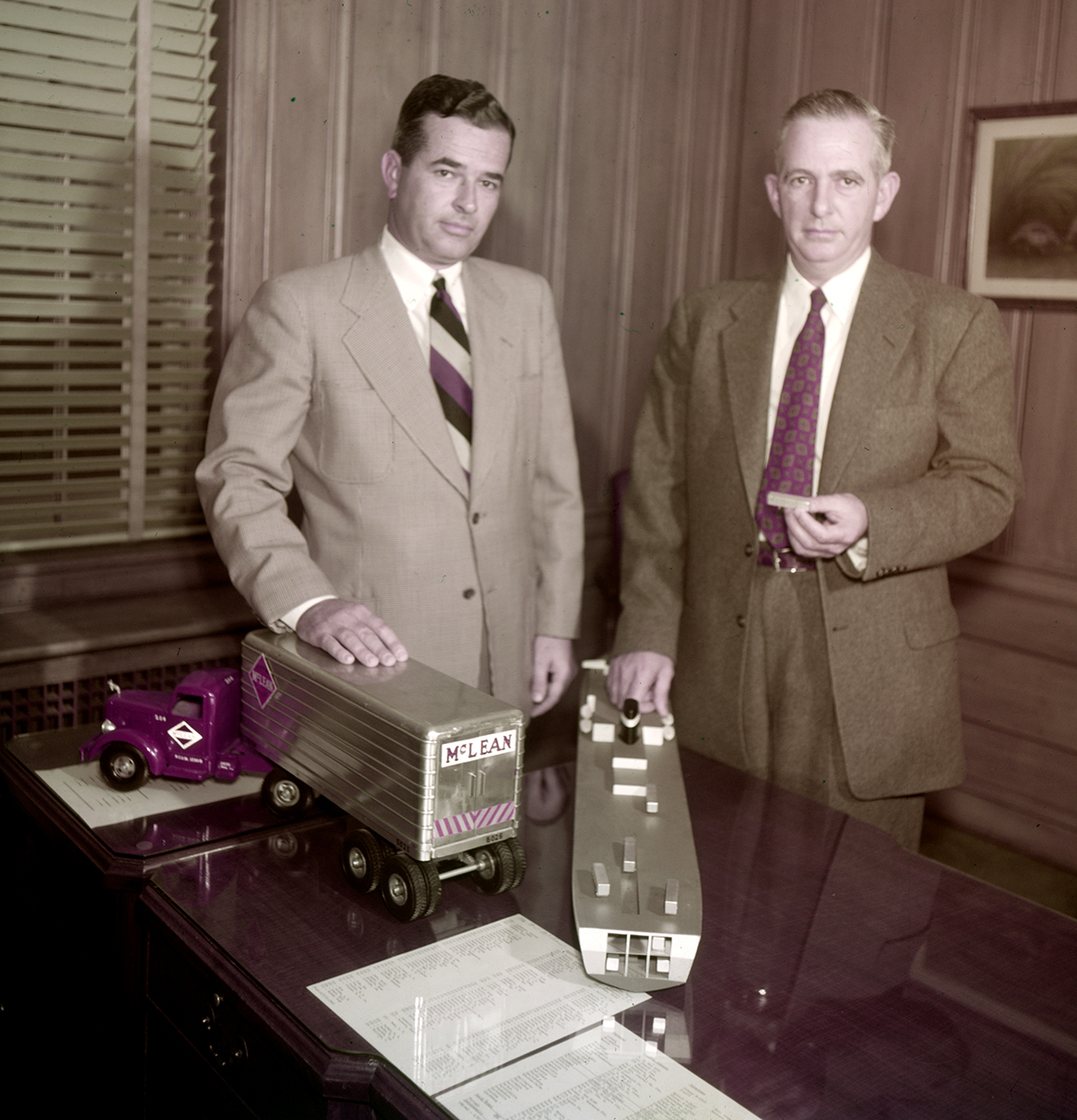 Jim and Malcom McLean demonstrate their shipping plans, Winston-Salem, North Carolina, photo Frank Jones, 1954. Reproduced courtesy of Forsyth County Public Library Photograph Collection, North Carolina, USA.