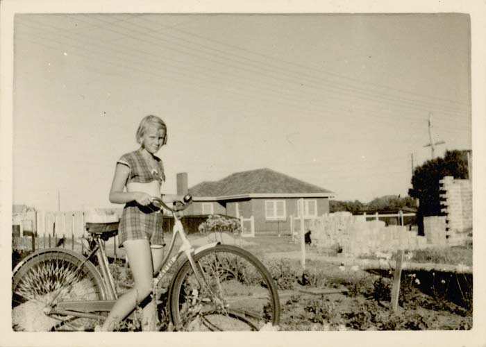 Maie Talmet in front of the house her father built, Largs North, 1950s. Reproduced courtesy Maie Barrow.