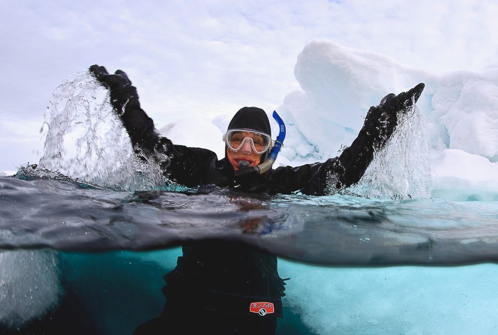 Dr Sylvia Earle celebrated her 80th birthday by snorkelling in the Arctic Ocean. Image Michael Aw, Svalbard, 2015.Dr Sylvia Earle celebrated her 80th birthday by snorkelling in the Arctic Ocean. Image Michael Aw, Svalbard, 2015.