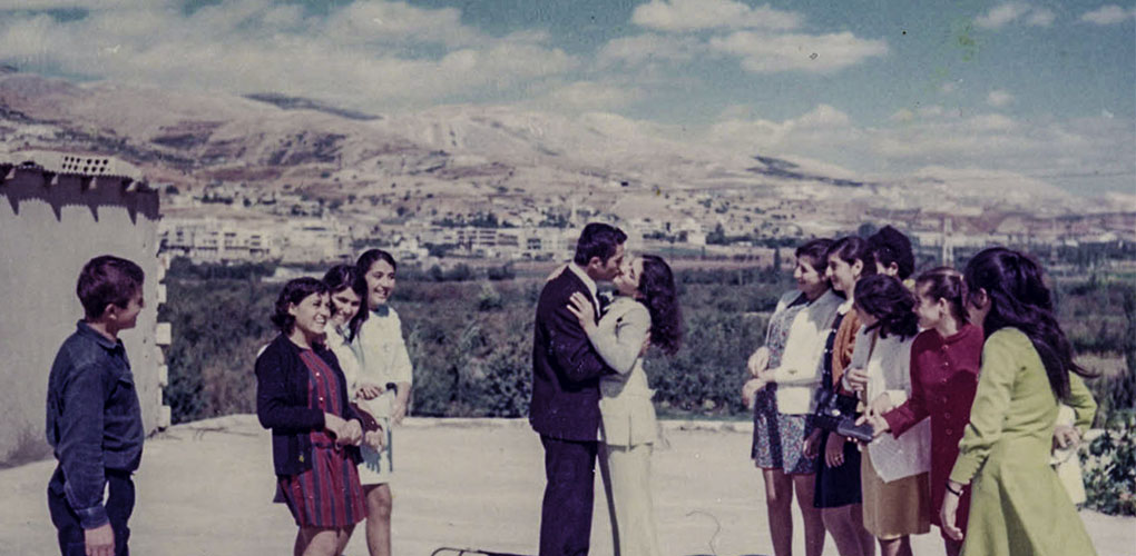Newlyweds Michel and Marie Nehme share a kiss on the rooftop of Michel’s family home in Maalaka, Zahlé, Lebanon, 1969.