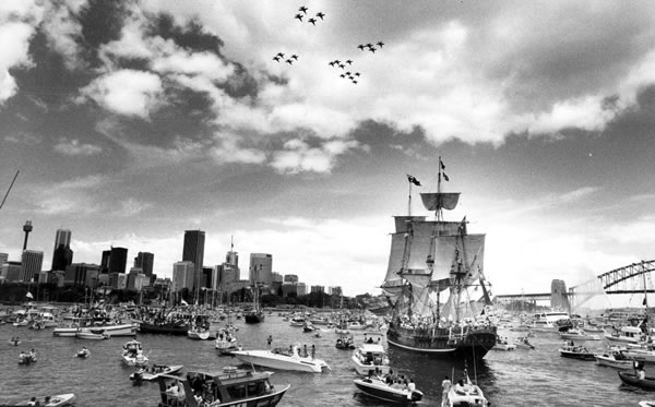 Tall ship First Fleet re-enactment on Sydney Harbour, Australia Day, 1988. The Australian Bicentenary was marked with much ceremony across Australia. Australian Overseas Information Service - National Archives of Australia, via Wikimedia.