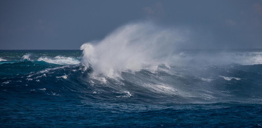 : Weather conditions at Boot Reef can generate massive seas that would make short work of a stranded wooden vessel. The waves shown in this image occurred during the expedition and reached heights of between three and four metres. Image: Julia Sumerling/Silentworld Foundation.
