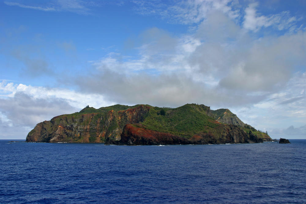 Pitcairn Island from the east. To the left of the image is Bounty Bay, where the ship was deliberately destroyed. © Claude Huot/Shutterstock