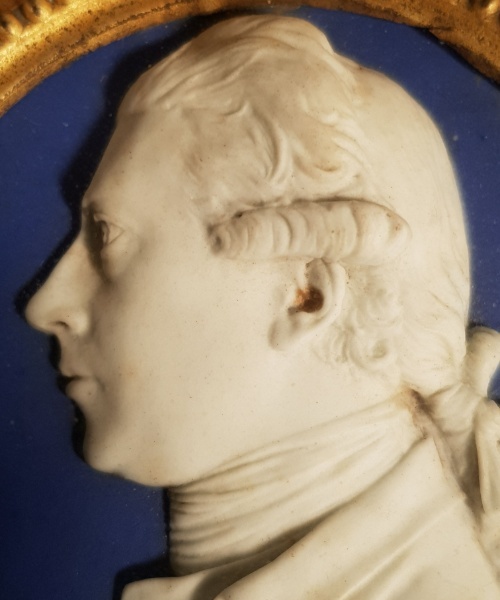 Close up of the wedgwood blue jasper oval cameo medallion of Joseph Banks