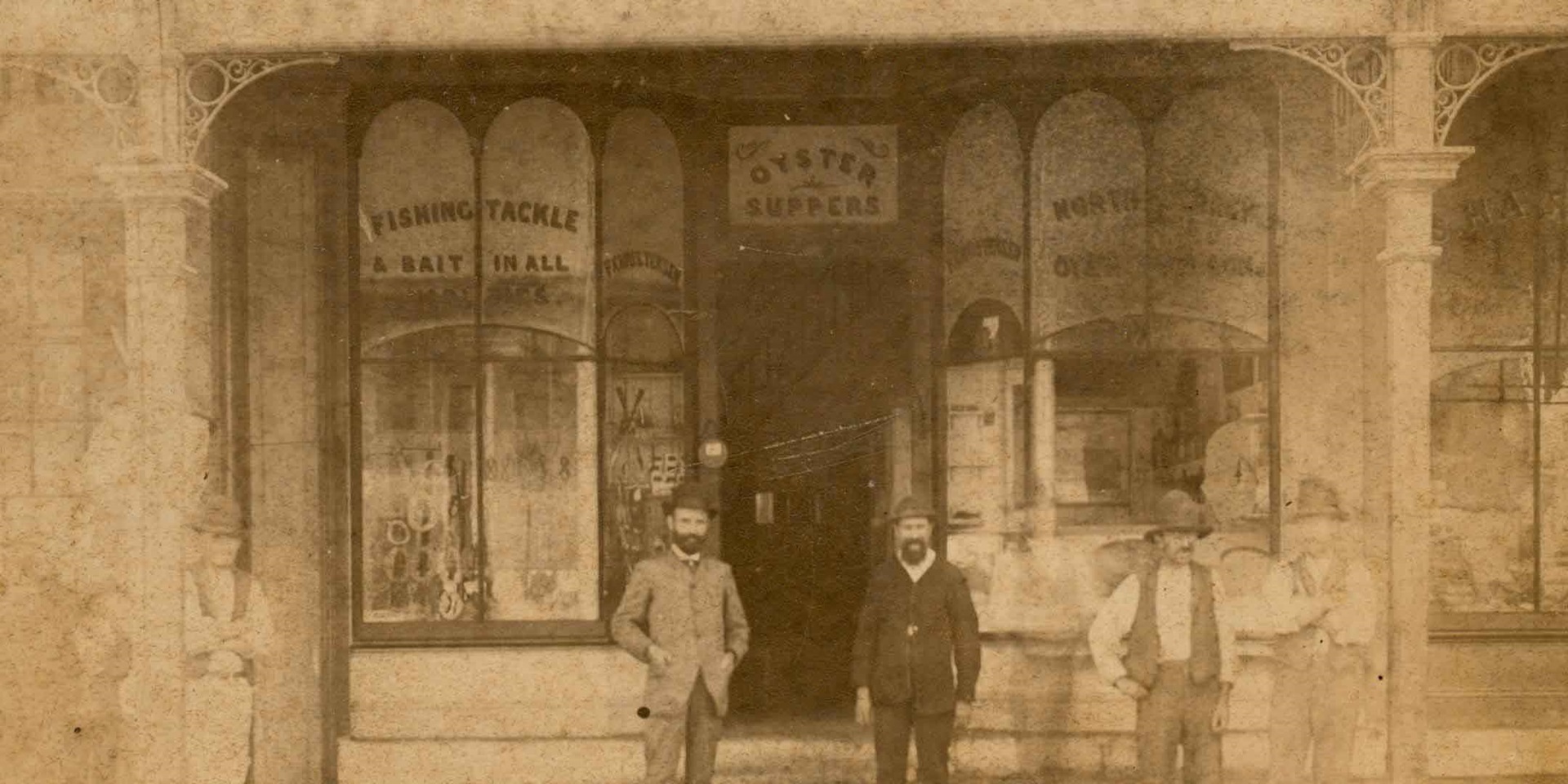 This photo is thought to show Frederick Christensen (centre) in front of his rooms at 151 George Street, Sydney, in the 1890s. Courtesy Christine Fraser