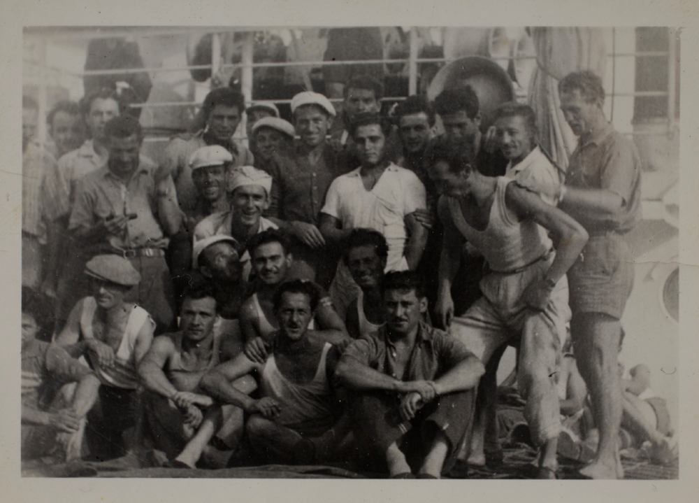 Group of migrants on the deck of MV Napoli, 1951. Many went to work on the Snowy Mountains Hydro-Electric Scheme. ANMM Collection Gift from Davide Ellero 00003536