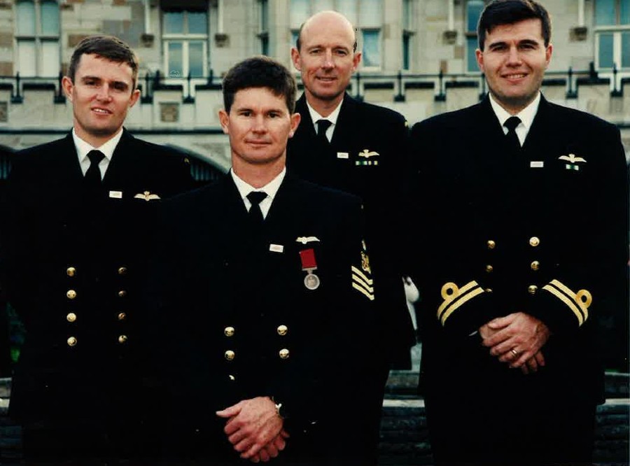 Photograph showing four men from the Royal Australian Navy