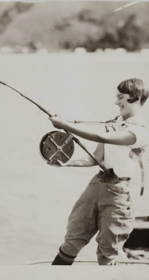 Cora Dunphy fishing on Lindeman Island, 1928
