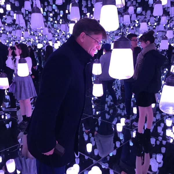 Kevin Sumption, CEO & Director of the Australian National Maritime Museum viewing 'A forest of resonating lamps'
