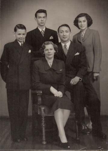The Kwok family in Shanghai, Christmas 1955. Edith and Edward are seated with their three children (left to right) Peder, Paul and Pamela. Reproduced courtesy Paul Kwok.
