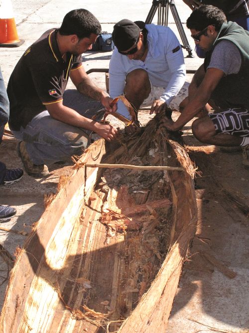 Tribal Warrior helps Aboriginal youth to learn traditional practices, such as building the nawi (tied-bark canoes) of the Sydney region. Image Andrew Frolows