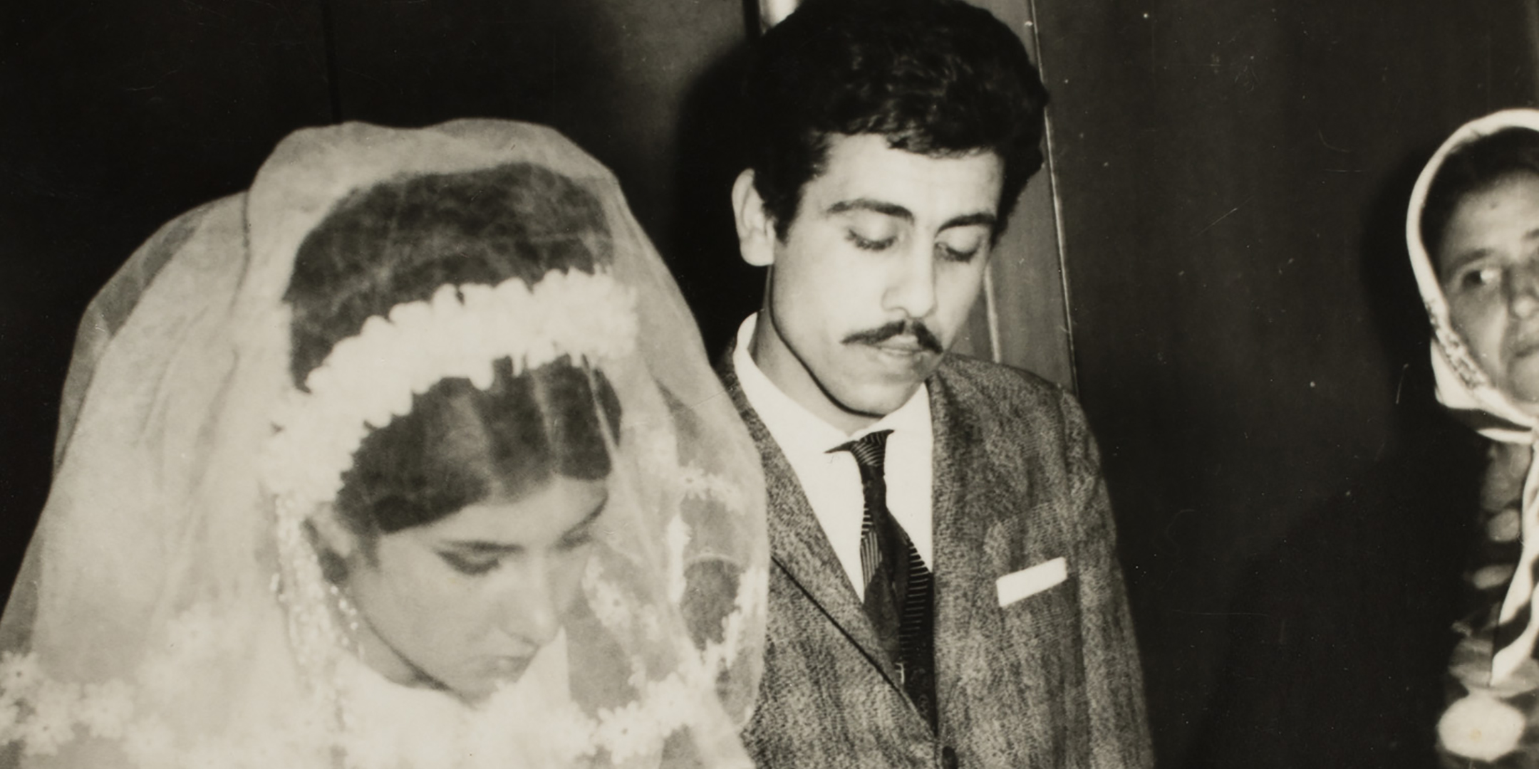 Şükran and Halit Adasal signing their marriage documents, with Şükran’s mother Sultan Salman at far right, Adana, Turkey, 1966. Reproduced courtesy Hale Adasal.