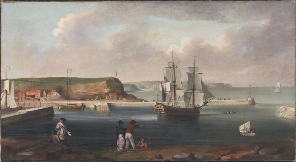 A painting of a collier ship is docked in Whitby Harbor, on the shoreline there are people gathered looking out to sea 