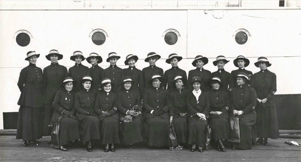 Red Cross 'Bluebird' nurses awaiting embarkation on the troopship Kanowna, Melbourne, 6 July 1916. Photographer: Josiah Earl Barnes, ANMM Collection 00027608