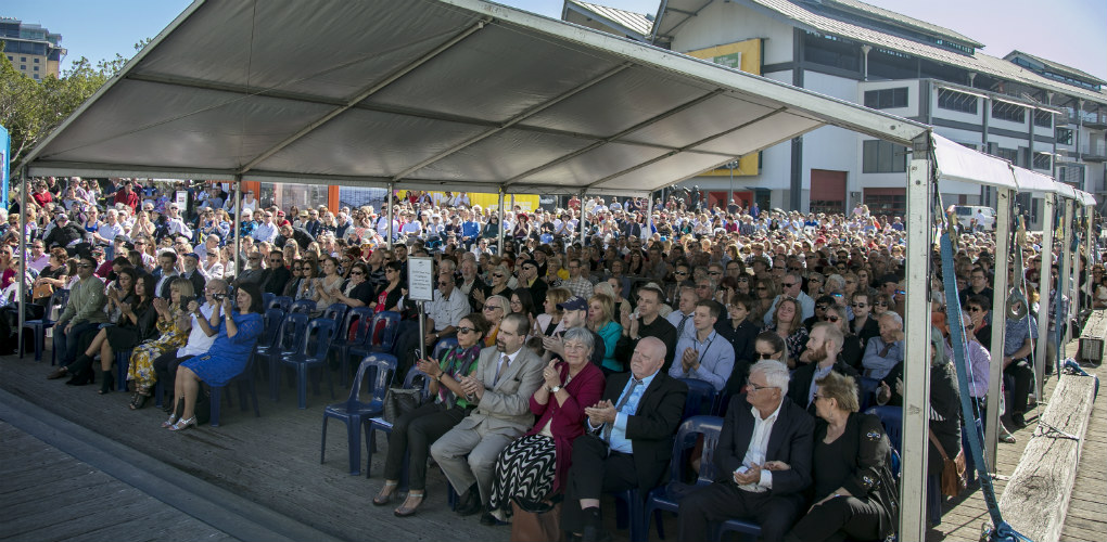 Welcome Wall unveiling ceremony, 7 May 2018. Guests in the crowd seated during the event.