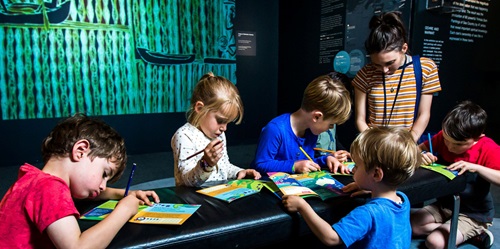 kids doing an activity trail in the museum
