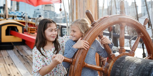 2 girls on the replica Endeavour