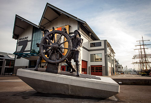 Photograph of the Windjammer Sailors sculpture outside the ANMM's Wharf 7 Heritage Centre